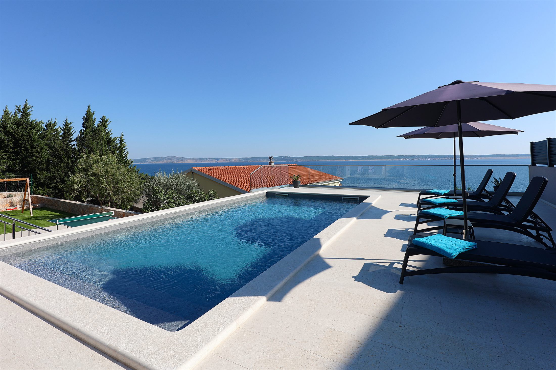 Private swimming pool at Apartment Lina